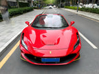 A sports car with Renovated Ferrari Red paint protection film colored wrap is parking in the garage