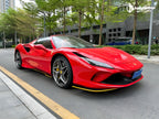 A sports car with Renovated Ferrari Red paint protection film colored wrap is parking in the garage