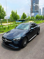 A sports car with Turquoise Green paint protection film colored wrap is parking in the garage