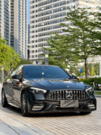 A sports car with Bright Graphite Gray paint protection film colored wrap is parking in the garage