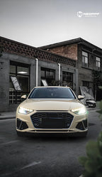 A sports car with Sahara Yellow paint protection film colored wrap is parking in the garage