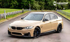 A sports car with Desert Storm paint protection film colored wrap is parking in the garage