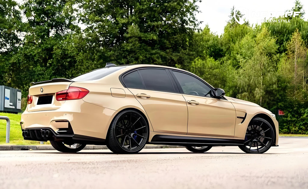 A sports car with Desert Storm paint protection film colored wrap is parking in the garage