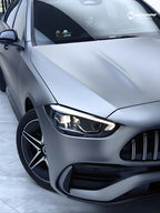A sports car with Volcanic Gray paint protection film colored wrap is parking in the garage