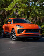 A sports car with Papaiya Orange paint protection film colored wrap is parking in the garage