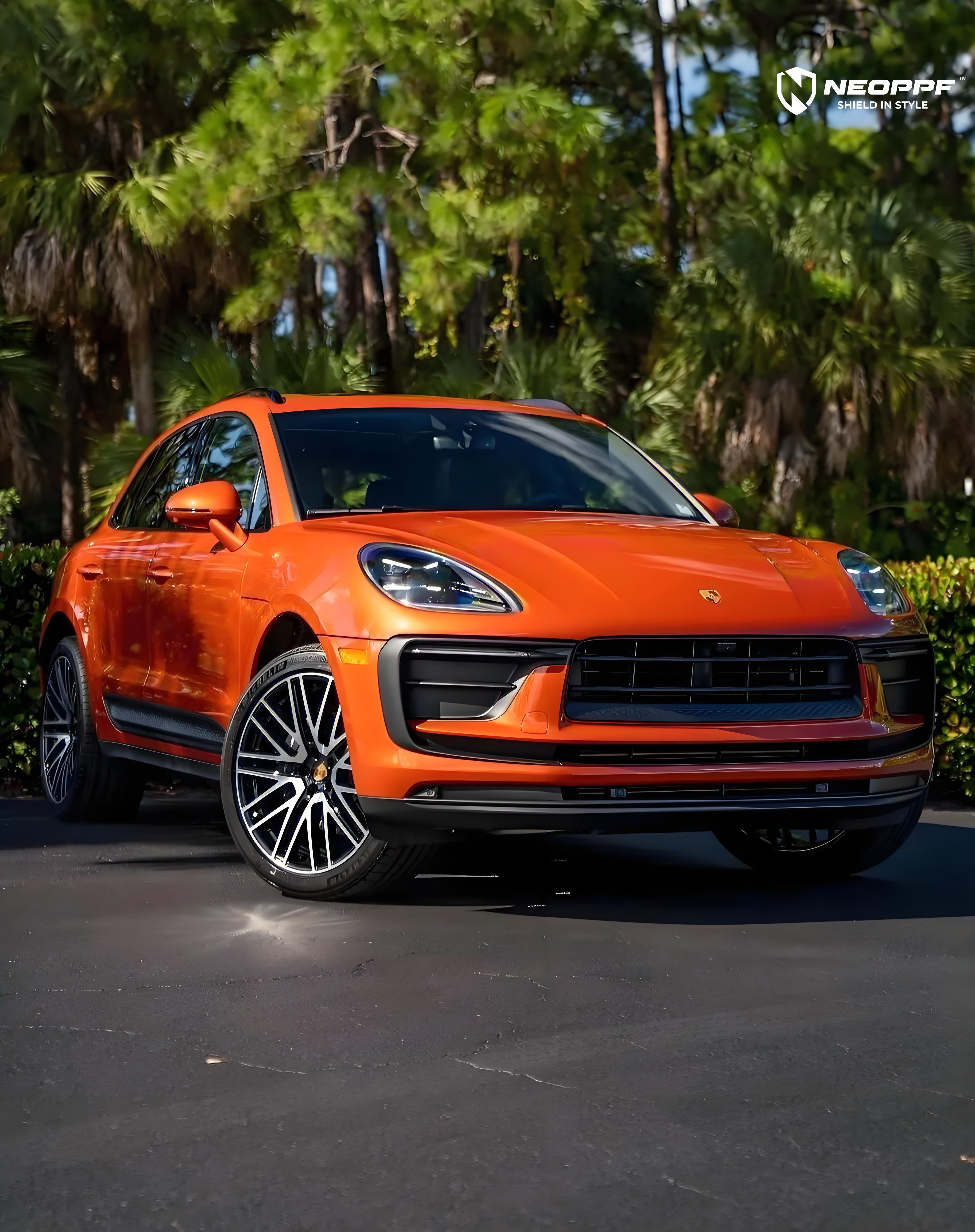 A sports car with Papaiya Orange paint protection film colored wrap is parking in the garage