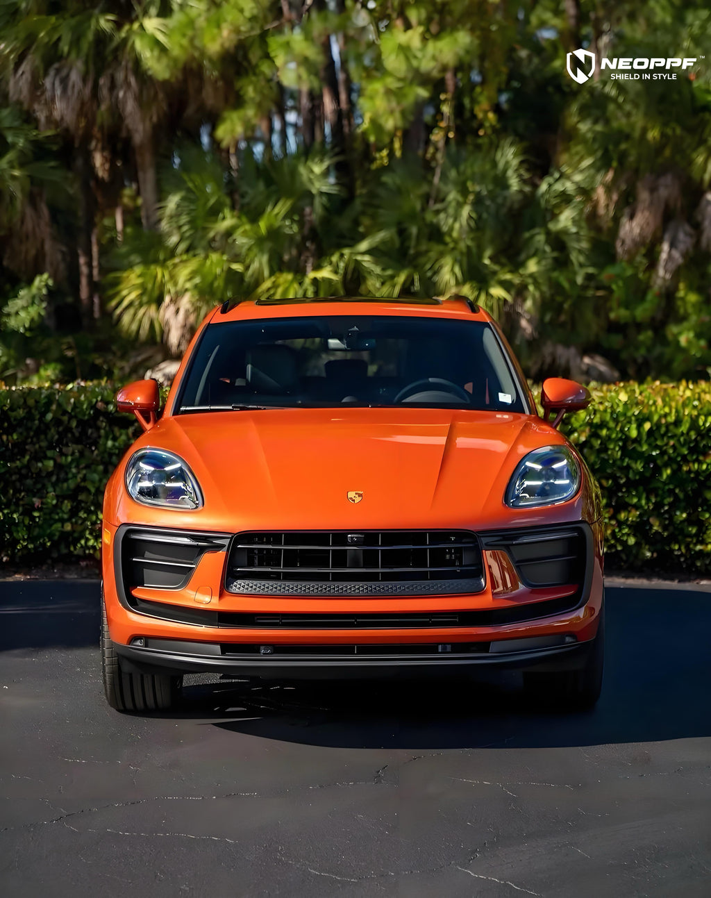 A sports car with Papaiya Orange paint protection film colored wrap is parking in the garage