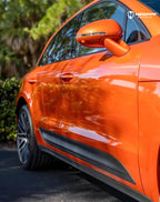 A sports car with Papaiya Orange paint protection film colored wrap is parking in the garage