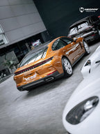 A sports car with Liquid Metallic Madeira Gold paint protection film colored wrap is parking in the garage