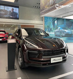 A sports car with Peach Rosewood paint protection film colored wrap is parking in the garage