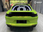A sports car with Peridot Metallic paint protection film colored wrap is parking in the garage