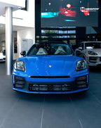 A sports car with Lugano Blue paint protection film colored wrap is parking in the garage