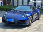 A sports car with Gentian Blue paint protection film colored wrap is parking in the garage
