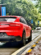 A sports car with Crystal Orange Red paint protection film colored wrap is parking in the garage