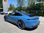 A sports car with Neptune Blue paint protection film colored wrap is parking in the garage