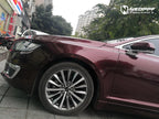 A sports car with Brocade Red paint protection film colored wrap is parking in the garage