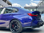 A sports car with Velvet Blue paint protection film colored wrap is parking in the garage
