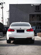 A sports car with Mineral White paint protection film colored wrap is parking in the garage