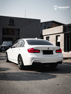 A sports car with Mineral White paint protection film colored wrap is parking in the garage
