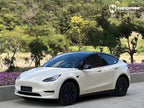 A sports car with Pepper White paint protection film colored wrap is parking in the garage
