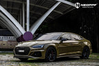 A sports car with Combat Green paint protection film colored wrap is parking in the garage