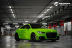 A sports car with Viper Green paint protection film colored wrap is parking in the garage