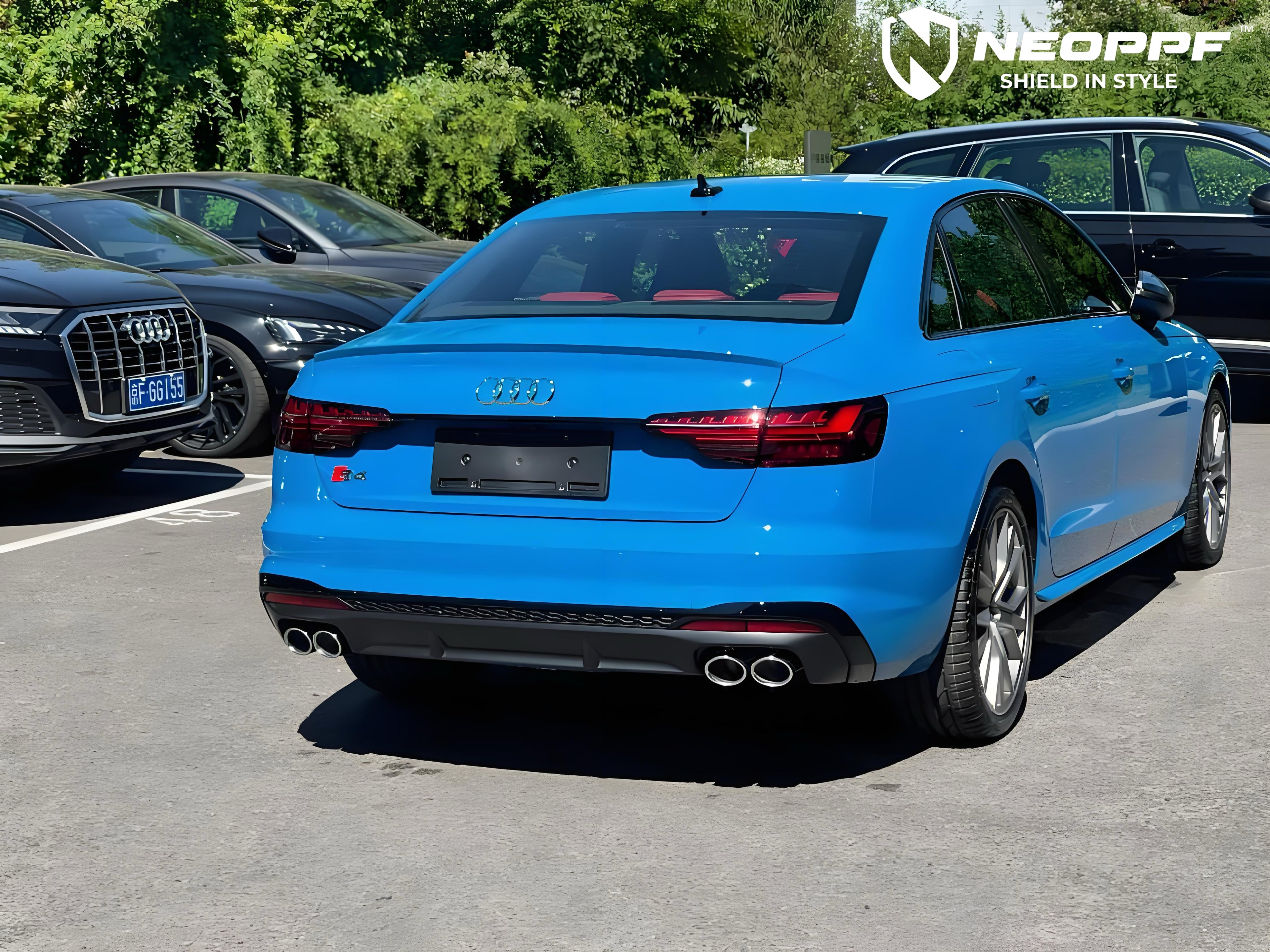 A sports car with Flowing Blue paint protection film colored wrap is parking in the garage
