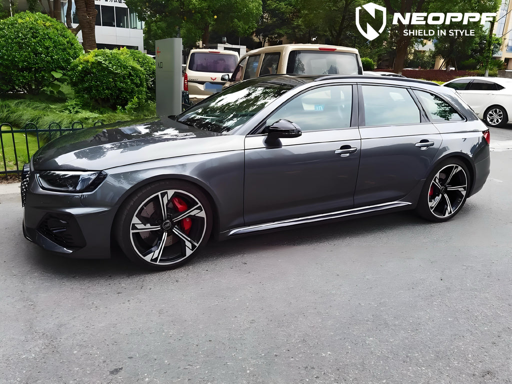A sports car with Far Peak Gray paint protection film colored wrap is parking in the garage