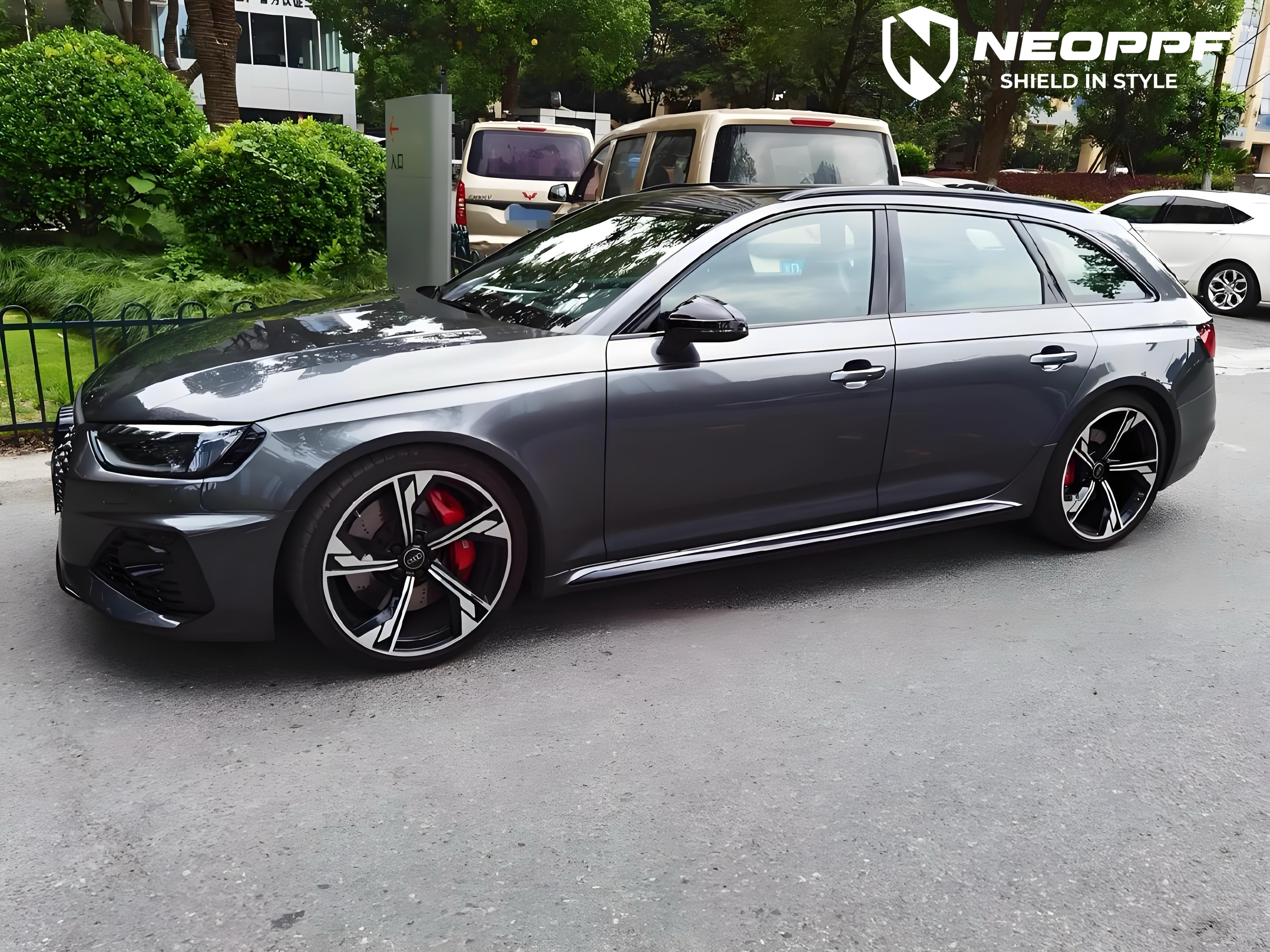 A sports car with Far Peak Gray paint protection film colored wrap is parking in the garage