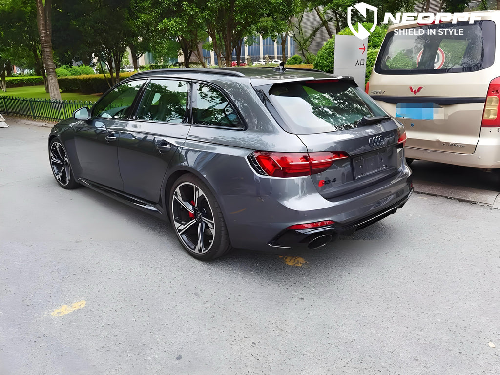 A sports car with Far Peak Gray paint protection film colored wrap is parking in the garage