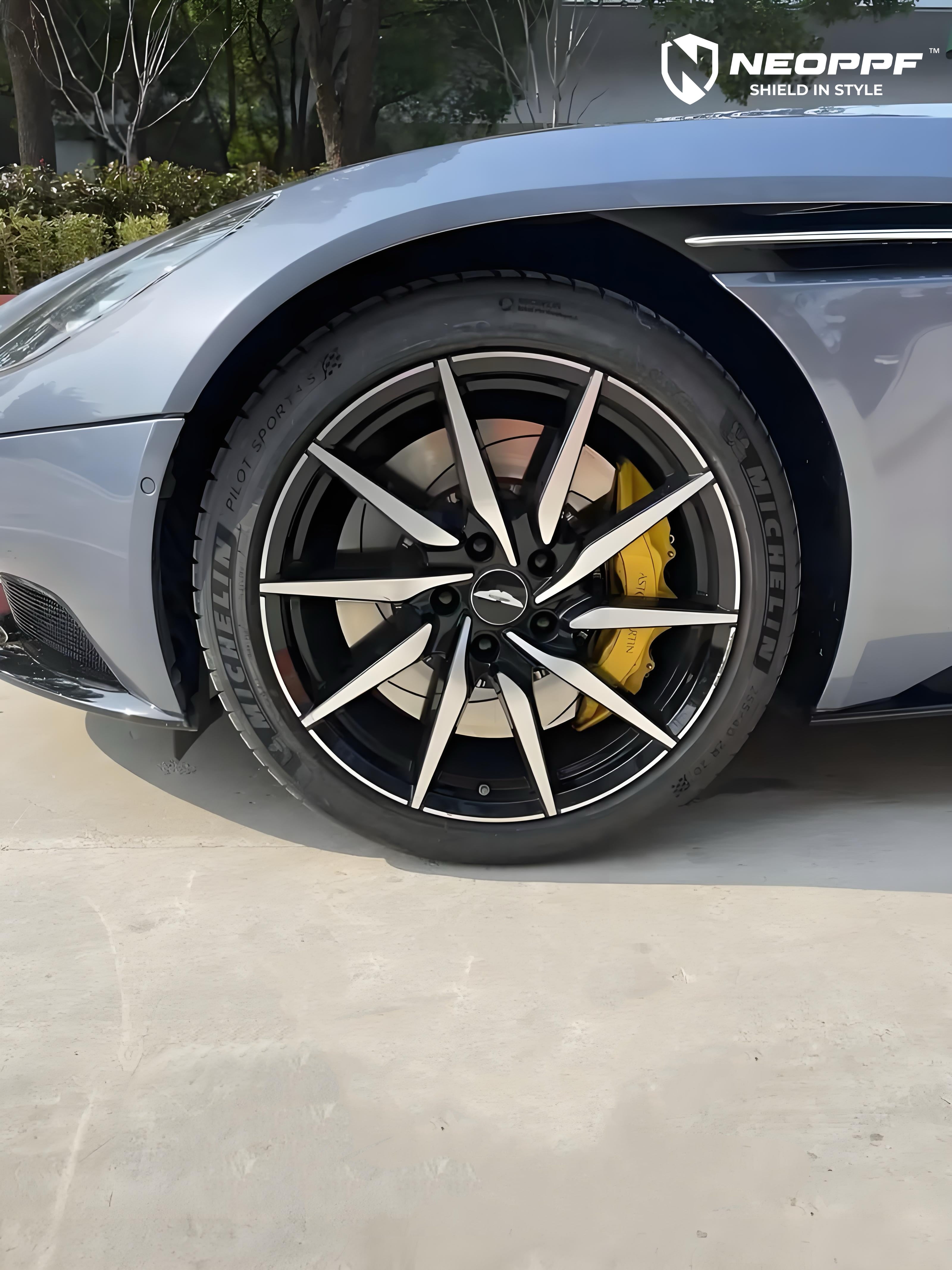 A sports car with Shark Blue paint protection film colored wrap is parking in the garage