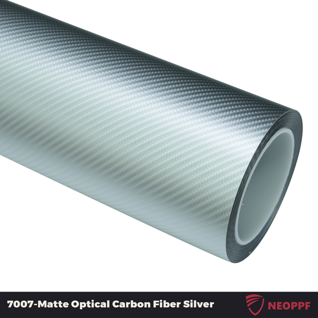 A sports car with Matte Optical Silver Carbon Fiber paint protection film colored wrap is parking in the garage