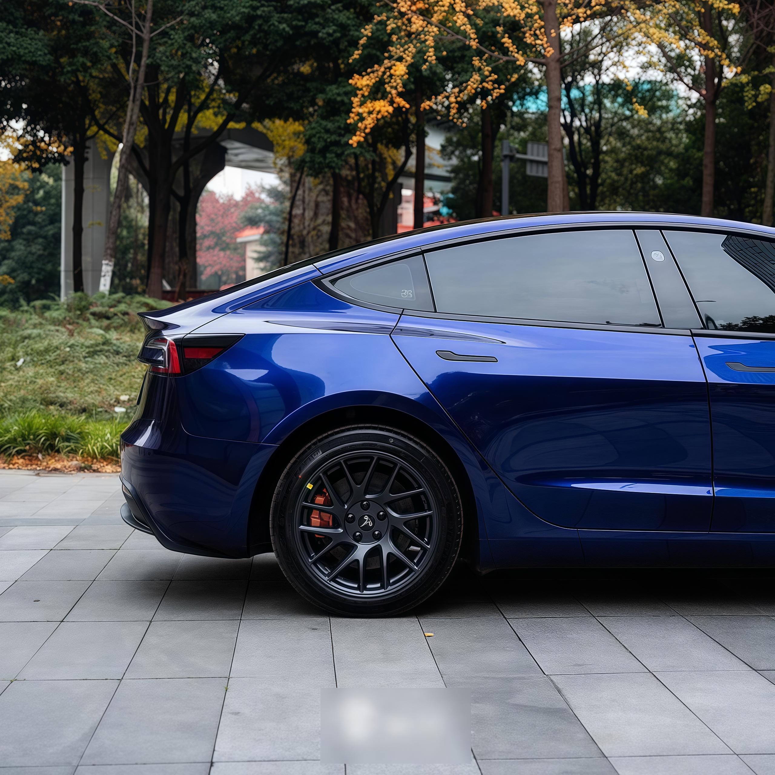 A sports car with Cobalt Blue Metallic paint protection film colored wrap is parking in the garage