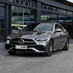 A sports car with Glowing Starlight Silver paint protection film colored wrap is parking in the garage