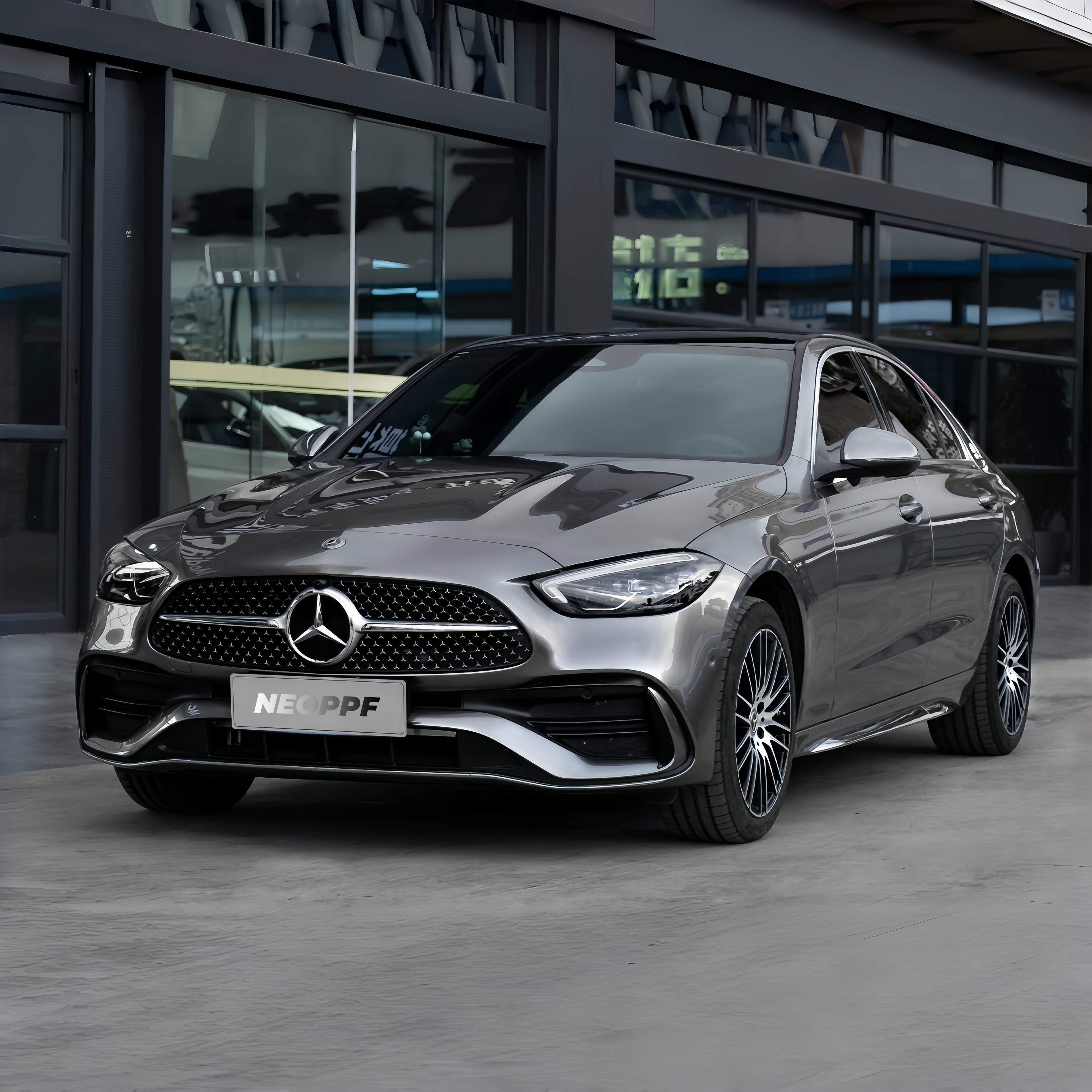 A sports car with Glowing Starlight Silver paint protection film colored wrap is parking in the garage