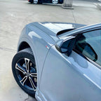 A sports car with Nardo Gray paint protection film colored wrap is parking in the garage