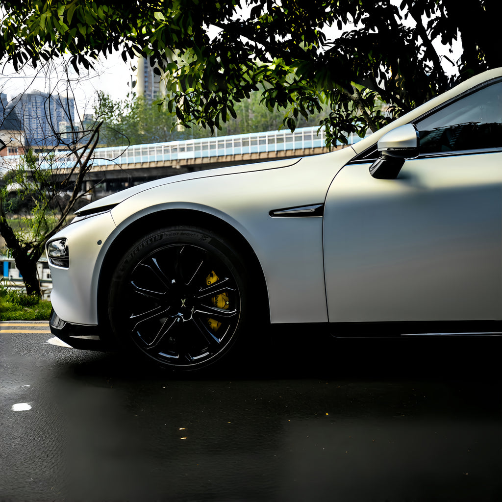 A sports car with Matte Blue Charm Gold paint protection film colored wrap is parking in the garage