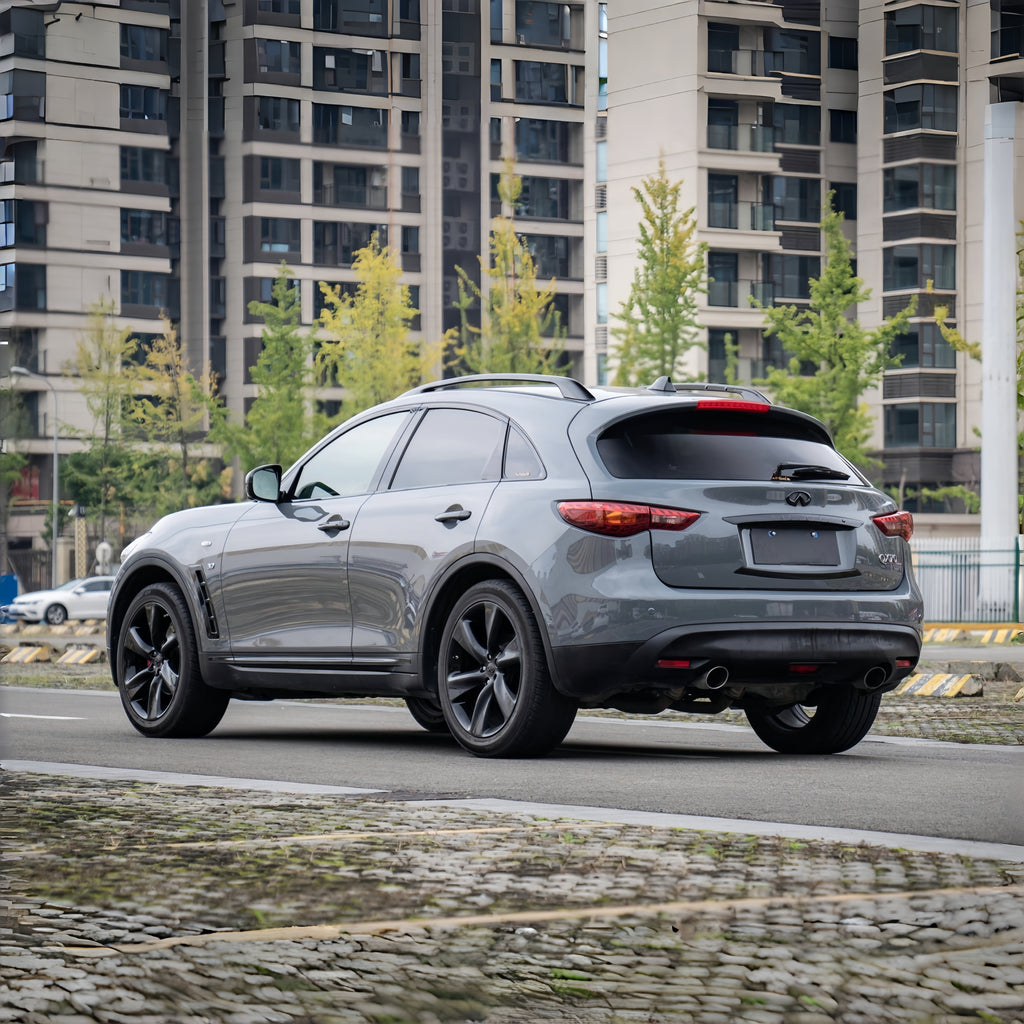 A sports car with Bright Dark Gray paint protection film colored wrap is parking in the garage