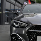 A sports car with Glowing Starlight Silver paint protection film colored wrap is parking in the garage
