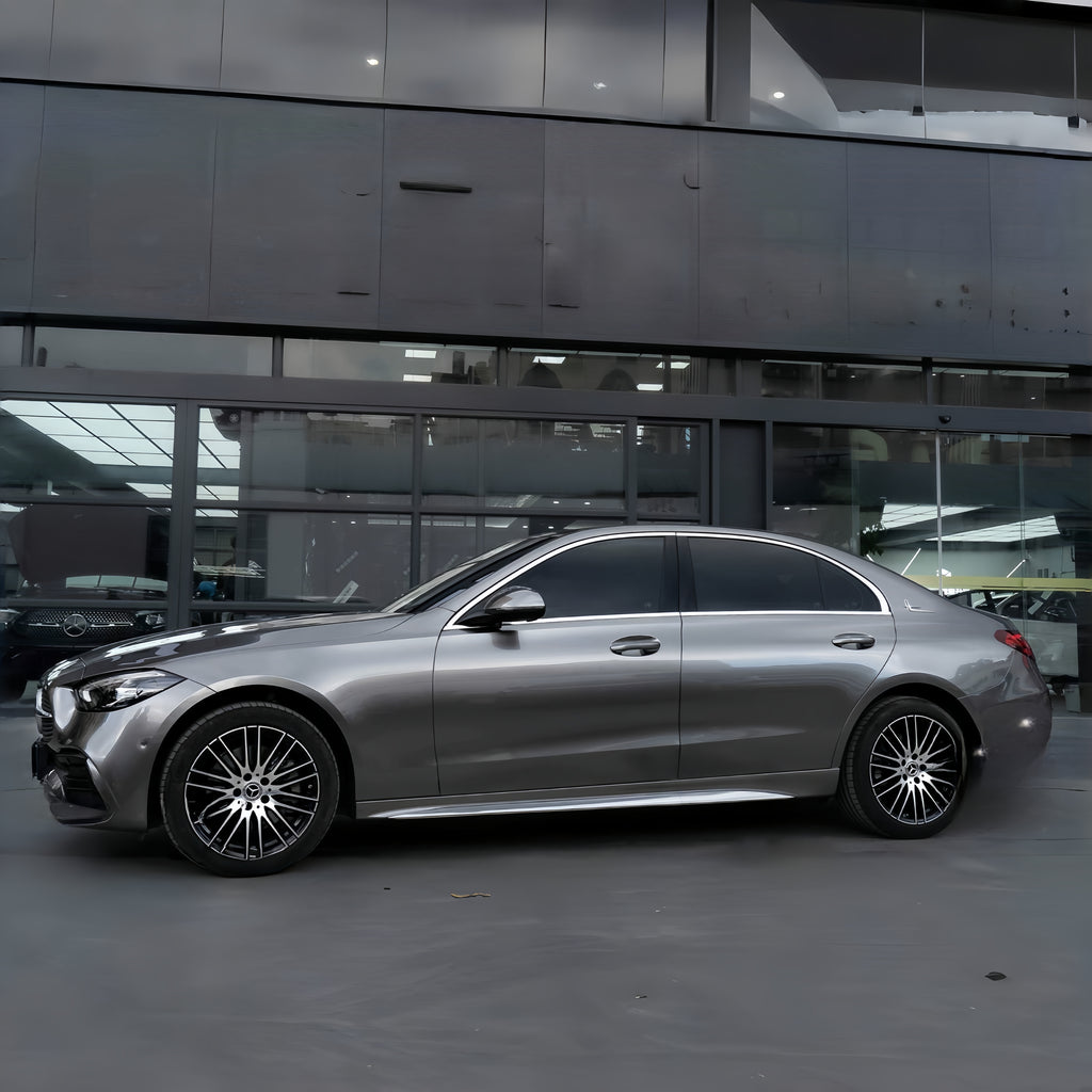 A sports car with Glowing Starlight Silver paint protection film colored wrap is parking in the garage