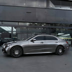A sports car with Glowing Starlight Silver paint protection film colored wrap is parking in the garage
