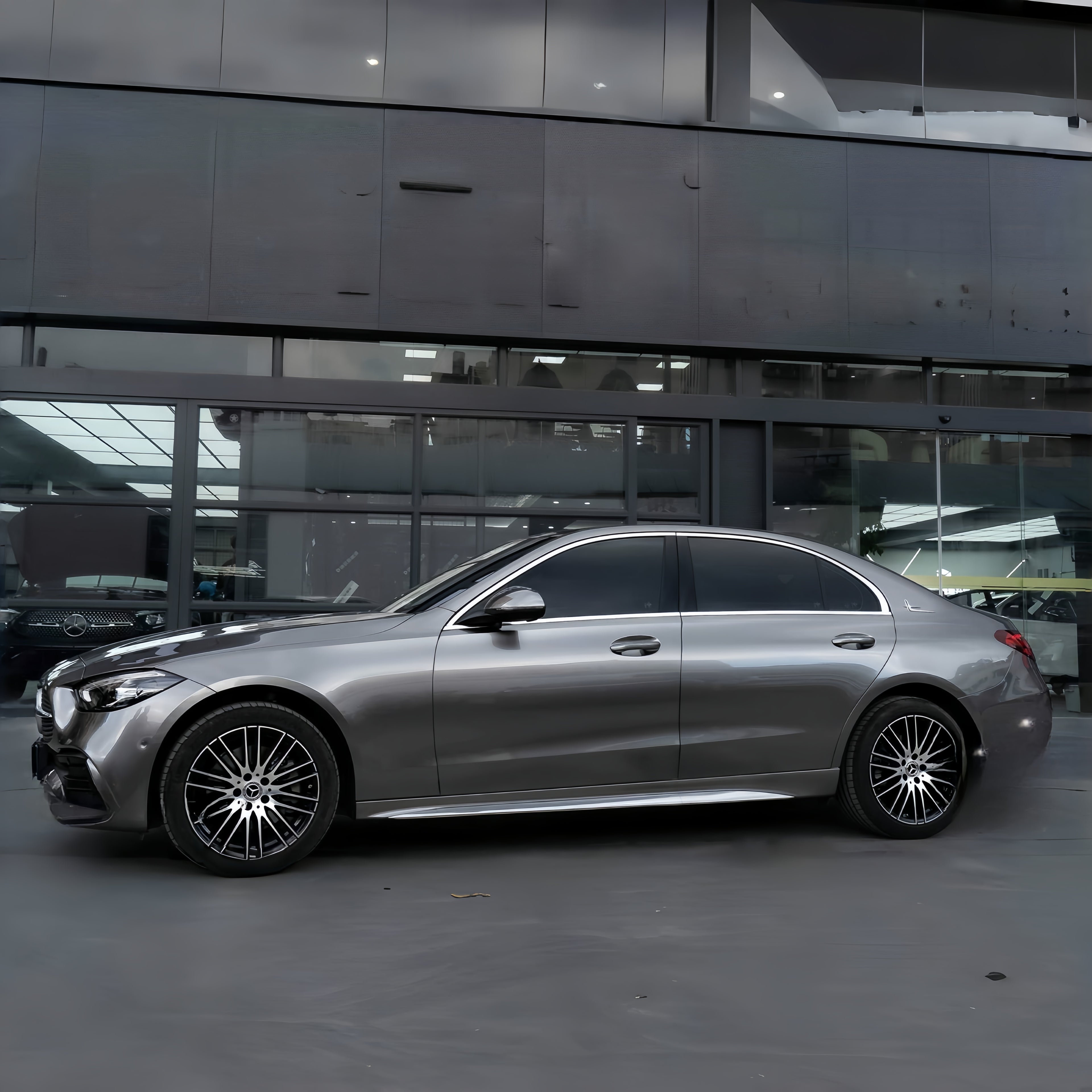 A sports car with Glowing Starlight Silver paint protection film colored wrap is parking in the garage