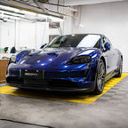 A sports car with Gentian Blue paint protection film colored wrap is parking in the garage