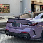 A sports car with Provence Purple paint protection film colored wrap is parking in the garage