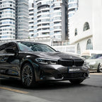 A sports car with Tungsten Metallic paint protection film colored wrap is parking in the garage