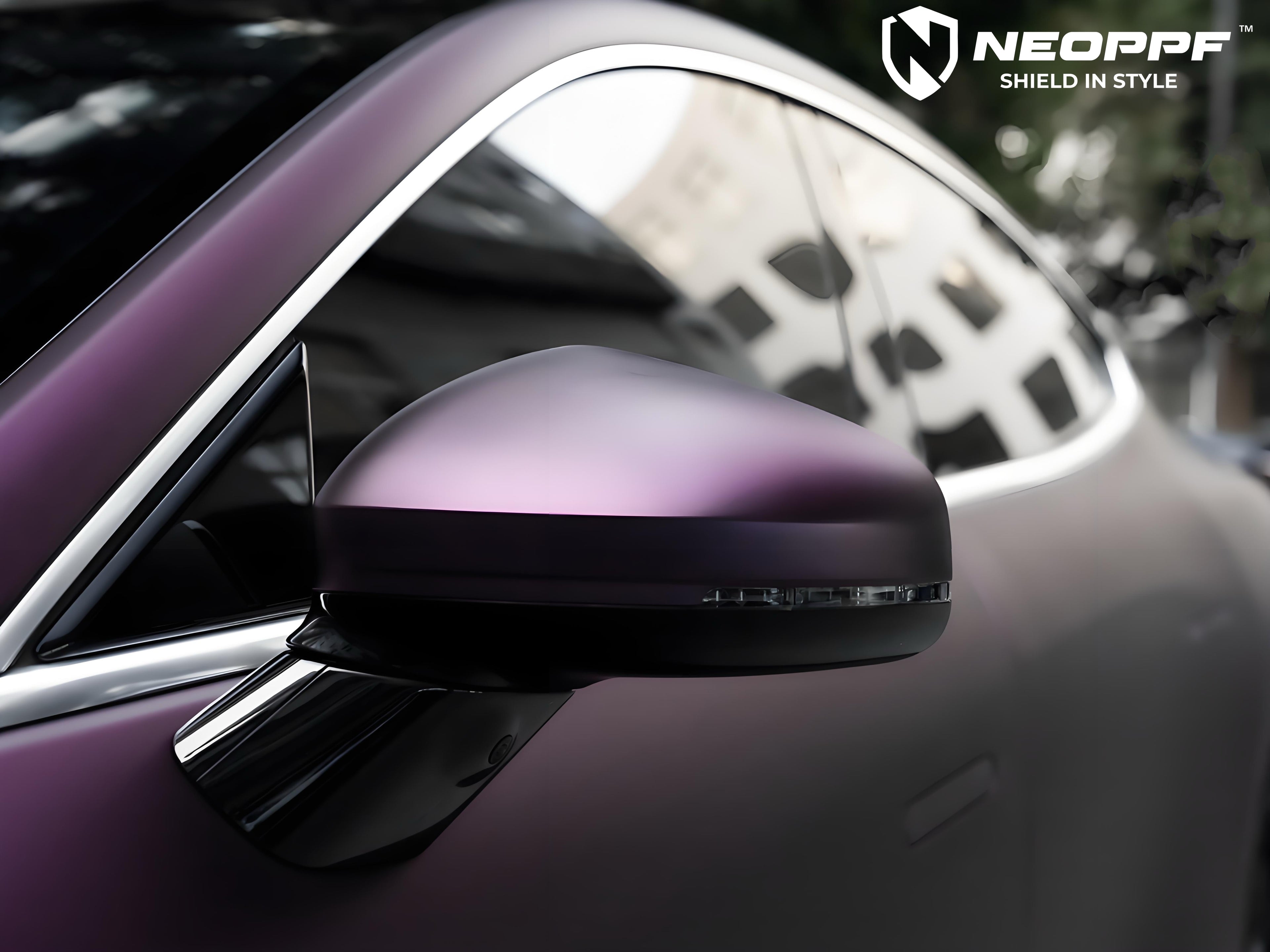 A sports car with Satin Pinot Noir Purple paint protection film colored wrap is parking in the garage