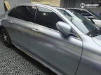 A sports car with Matte Optical Silver Carbon Fiber paint protection film colored wrap is parking in the garage