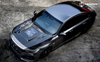A sports car with Matte Transparent Carbon Fiber paint protection film colored wrap is parking in the garage