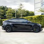 A sports car with Lyrical Copper paint protection film colored wrap is parking in the garage