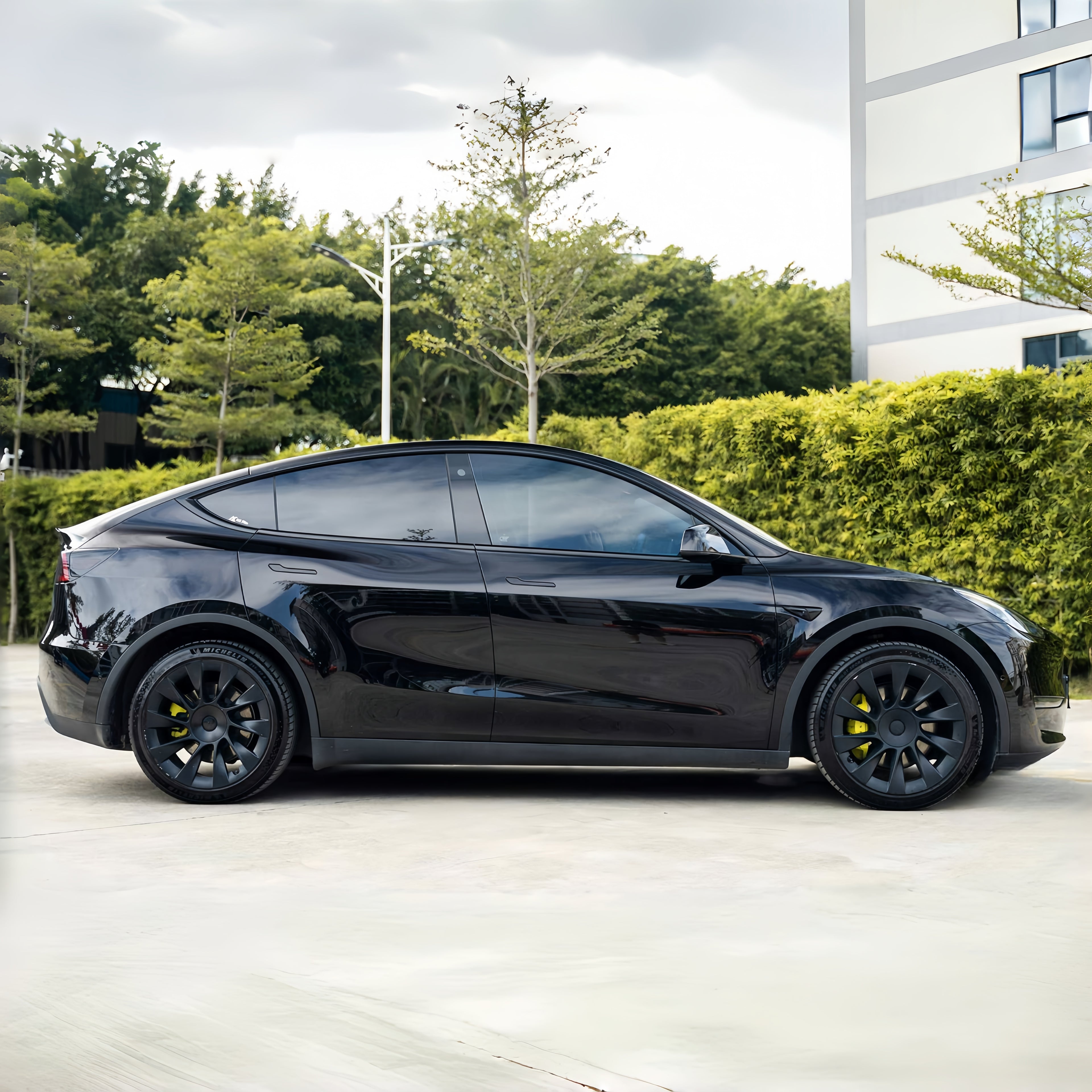 A sports car with Lyrical Copper paint protection film colored wrap is parking in the garage
